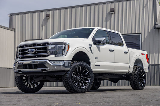 2022 Ford F-150 Lariat with a 6" Rough Country lift kit, 22x12 Fuel Rebar wheels, and 35" Fury Country Hunter R/T tires.