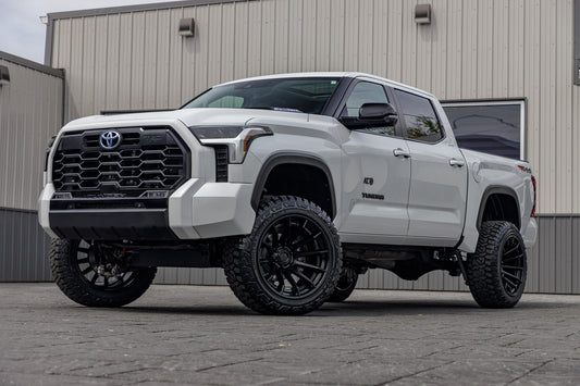 2024 Toyota Tundra Limited with a 6" Rough Country lift kit, 22x12 Fuel Burn wheels, and 35" Fury Country Hunter R/T tires.