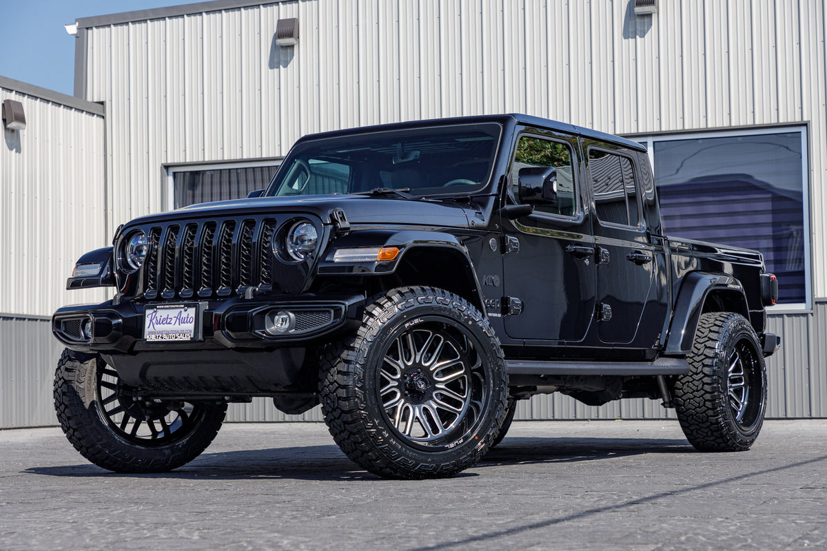 2023 Jeep Gladiator Overland with a 2.5" Rough Country lift kit, 22x12 Fuel Ignite wheels, and 35" Fury Country Hunter R/T tires.