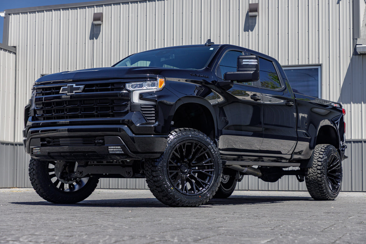 2024 Chevrolet Silverado 1500 RST with a 6" Rough Country lift kit, 22x12 Fuel Rebar wheels, and 35" Fury Country Hunter R/T tires.