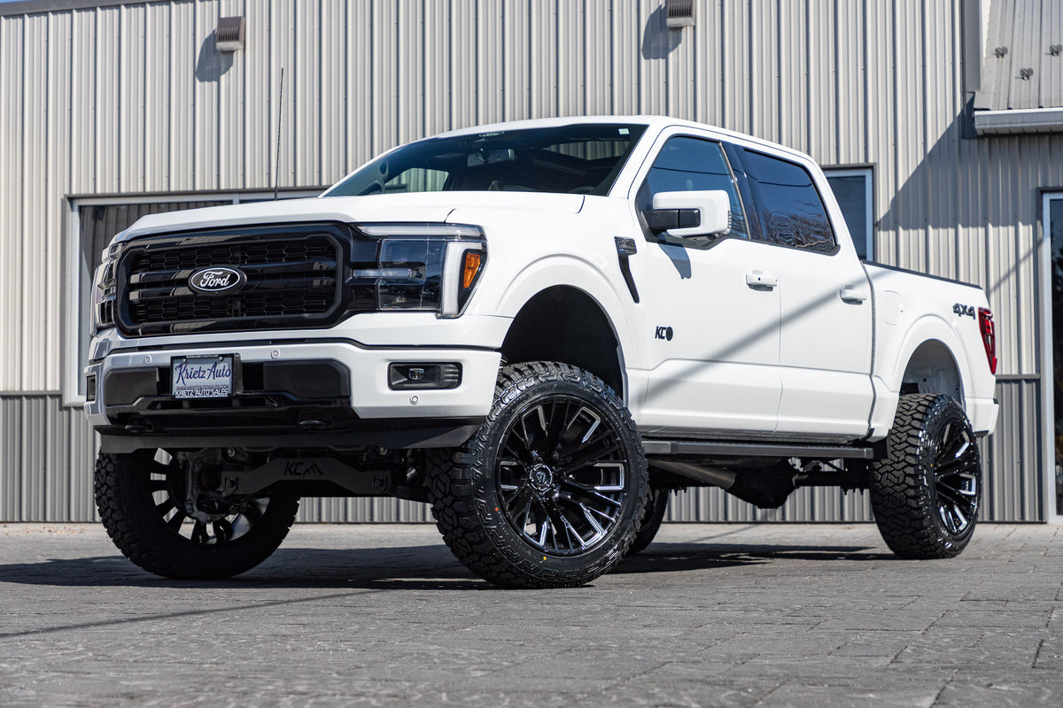 2025 Ford F-150 Lariat with a 6" Rough Country lift kit, 22x12 Fuel Rebar wheels, and 35" Fury Country Hunter R/T tires.