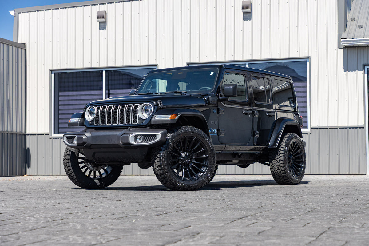 2025 Jeep Wrangler Sahara 4XE with a 2.5" Rough Country lift kit, 22x12 Fuel Blade wheels, and 35" Fury Country Hunter R/T tires.