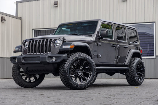 2024 Jeep Wrangler Sport with a 2.5" Rough Country lift kit, 22x12 Fuel Rebar wheels, and 35" Fury Country Hunter R/T tires.