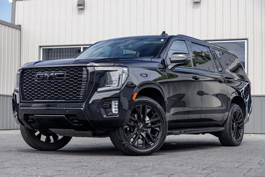 2023 GMC Yukon XL AT4 with GMC Factory suspension, 22x9 GMC Stock wheels, and Bridgestone Alenza tires.