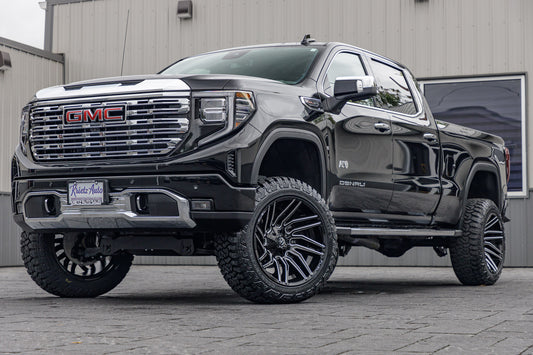 2024 GMC Sierra 1500 Denali with a 6" Rough Country suspension kit, 22x12 Fuel Typhoon wheels, and 35" Fury Country Hunter R/T tires.