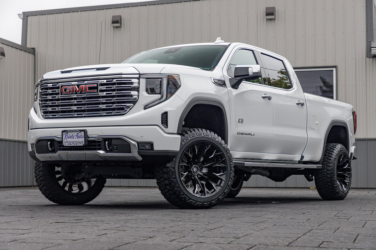 2024 GMC Sierra 1500 Denali with a 6" Rough Country suspension kit, 22x12 Fuel Twitch wheels, and 35" Fury Country Hunter R/T tires.