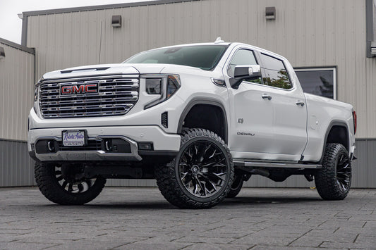 2024 GMC Sierra 1500 Denali with a 6" Rough Country suspension kit, 22x12 Fuel Twitch wheels, and 35" Fury Country Hunter R/T tires.