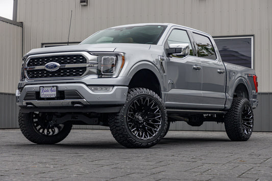 2023 Ford F-150 Platinum with a 6" Rough Country lift kit, 22x12 Fuel Strike wheels, and 35" Fury Country Hunter R/T tires.