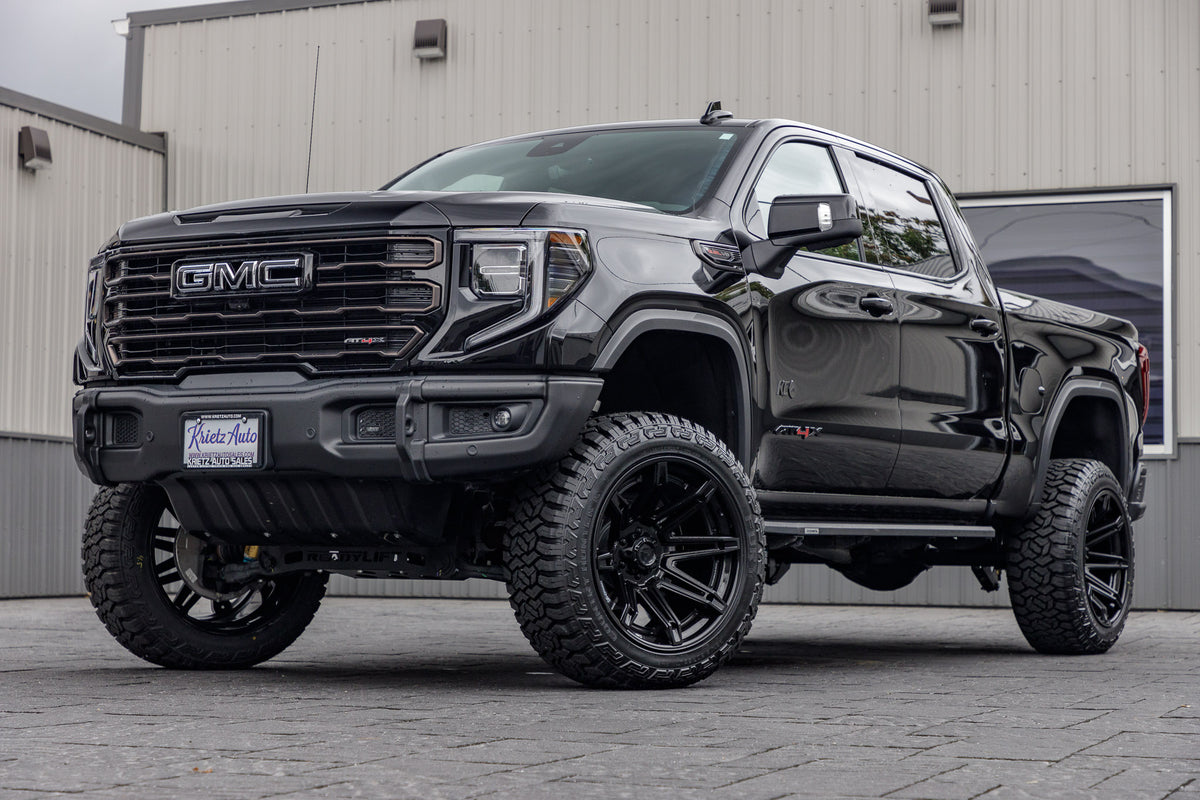 2024 GMC Sierra 1500 AT4X with a 4" ReadyLift lift kit, 22x12 Fuel Brawl wheels, and 35" Fury Country Hunter R/T tires.