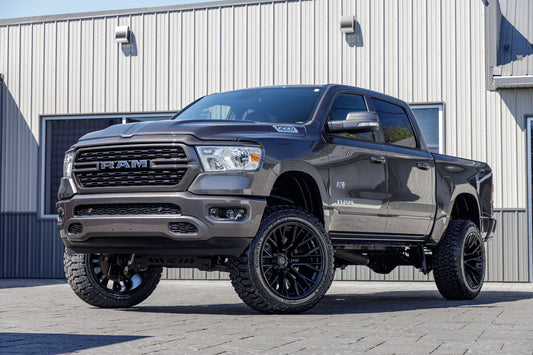 2022 Ram 1500 Lone Star with a 6" Rough Country lift kit, 22x12 Fuel Rebar wheels, and 35" Fury Country Hunter R/T tires.