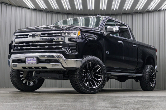 2023 Chevrolet Silverado 1500 LTZ with a 6" Rough Country lift kit, 22x12 Fuel Rebar wheels, and 35" Fury Country Hunter R/T tires.