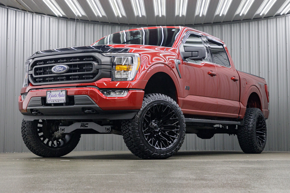 2022 Ford F-150 XLT with a 6" Rough Country lift kit, 22x12 Fuel Strike wheels, and 35" Fury Country Hunter R/T tires.