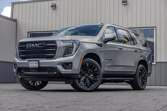 2025 GMC Yukon Elevation with GMC Factory suspension, 22x9 GMC Stock wheels, and 275/50 Bridgestone Alenza tires.