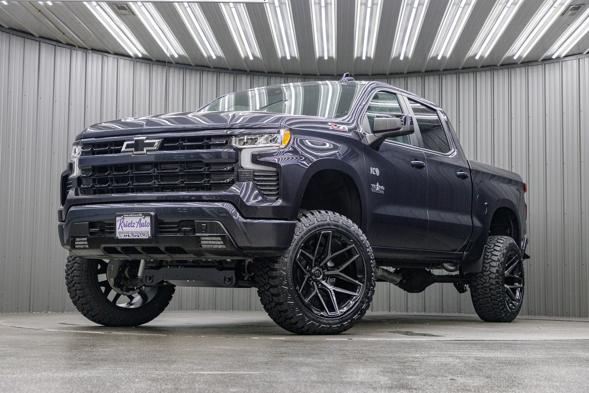 2023 Chevrolet Silverado 1500 RST with a 6" Rough Country lift kit, 22x12 Fuel Flux wheels, and 35" Fury Country Hunter R/T tires.