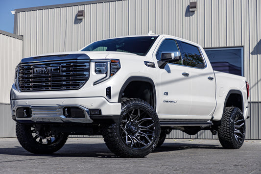 2024 GMC Sierra 1500 Denali Ultimate with a 6" Rough Country suspension kit, 22x12 Fuel Twitch wheels, and 35" Fury Country Hunter R/T tires.