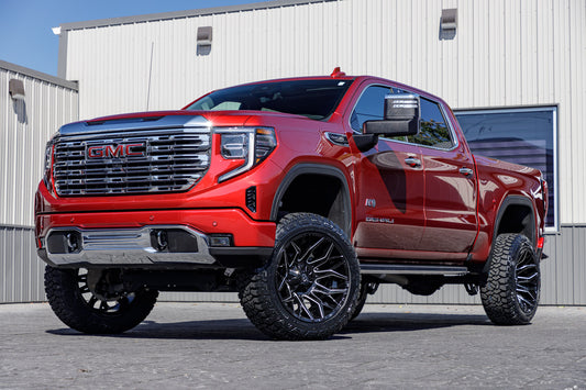 2024 GMC Sierra 1500 Denali with a 6" Rough Country suspension kit, 22x12 Fuel Twitch wheels, and 35" Fury Country Hunter R/T tires.
