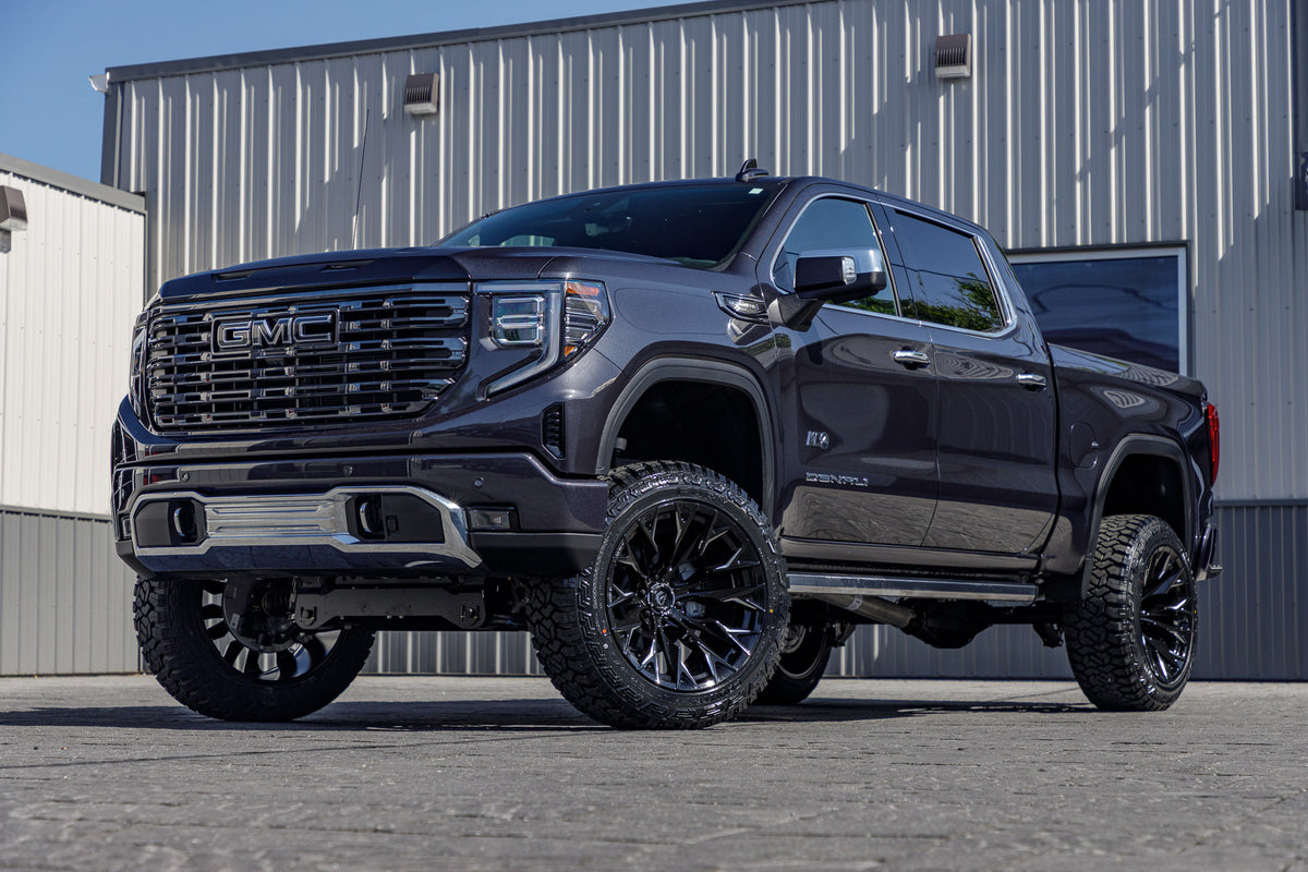 2025 GMC Sierra 1500 Denali Ultimate with a 6" Rough Country lift kit, 22x12 Fuel Flame wheels, and 35" Fury Country Hunter R/T tires.