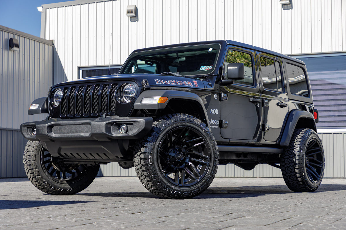 2021 Jeep Wrangler Unlimited Sport S with a 2.5" Rough Country lift kit, 22x12 Fuel Typhoon wheels, and 35" Fury Country Hunter R/T tires.