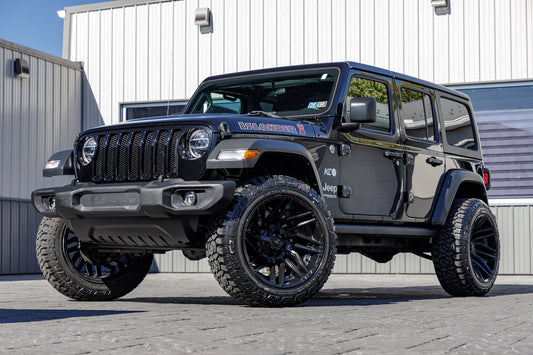 2021 Jeep Wrangler Unlimited Sport S with a 2.5" Rough Country lift kit, 22x12 Fuel Typhoon wheels, and 35" Fury Country Hunter R/T tires.