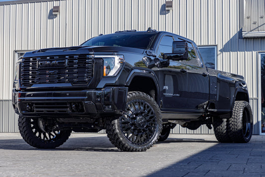 2024 GMC Sierra 3500 Denali with a 4" CST lift kit, 26x8.25 American Force Evo wheels, and 37" Fury Country Hunter M/T tires.