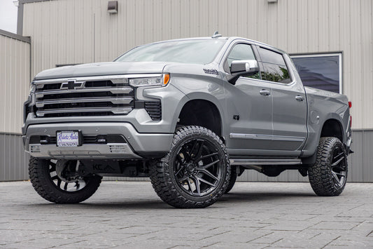 2024 Chevrolet Silverado 1500 High Country with a 6" Rough Country lift kit, 22x12 Fuel Flux wheels, and 35" Fury Country Hunter R/T tires.