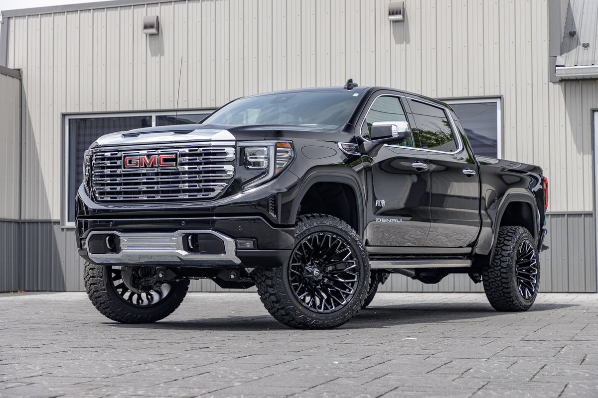 2025 GMC Sierra 1500 Denali with a 6" BDS lift kit, 22x12 Fuel Strike wheels, and 35" Fury Country Hunter R/T tires.