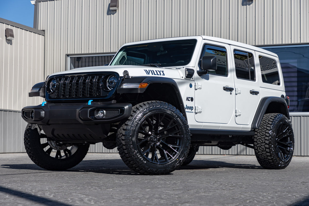 2024 Jeep Wrangler Unlimited Willys 4XE with a 2.5" Rough Country lift kit, 22x12 Fuel Rebar wheels, and 35" Fury Country Hunter R/T tires.