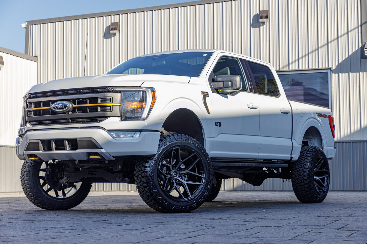 2023 Ford F-150 Tremor with a 6" Rough Country lift kit, 22x12 Fuel Flux wheels, and 35" Fury Country Hunter R/T tires.