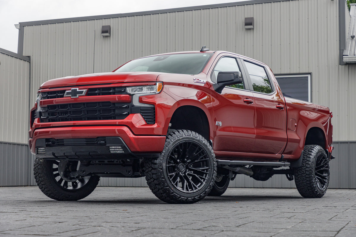 2024 Chevrolet Silverado RST with a 6" Rough Country lift kit, 22x12 Fuel Rebar wheels, and 35" Fury Country Hunter R/T tires.