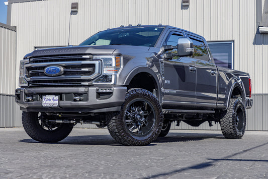 2022 Ford F-250 Super Duty Platinum with a 4" ReadyLift lift kit, 22x12 Fuel Lockdown wheels, and 35" Nitto Ridge Grappler tires.