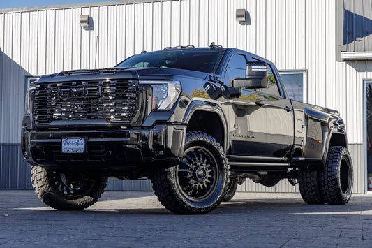 2025 GMC Sierra 3500 Denali Ultimate with a 5" Rough Country lift kit, 22x8.25 Fuel Arc wheels, and 37" Rolling Big Power Repulsion M/T tires.