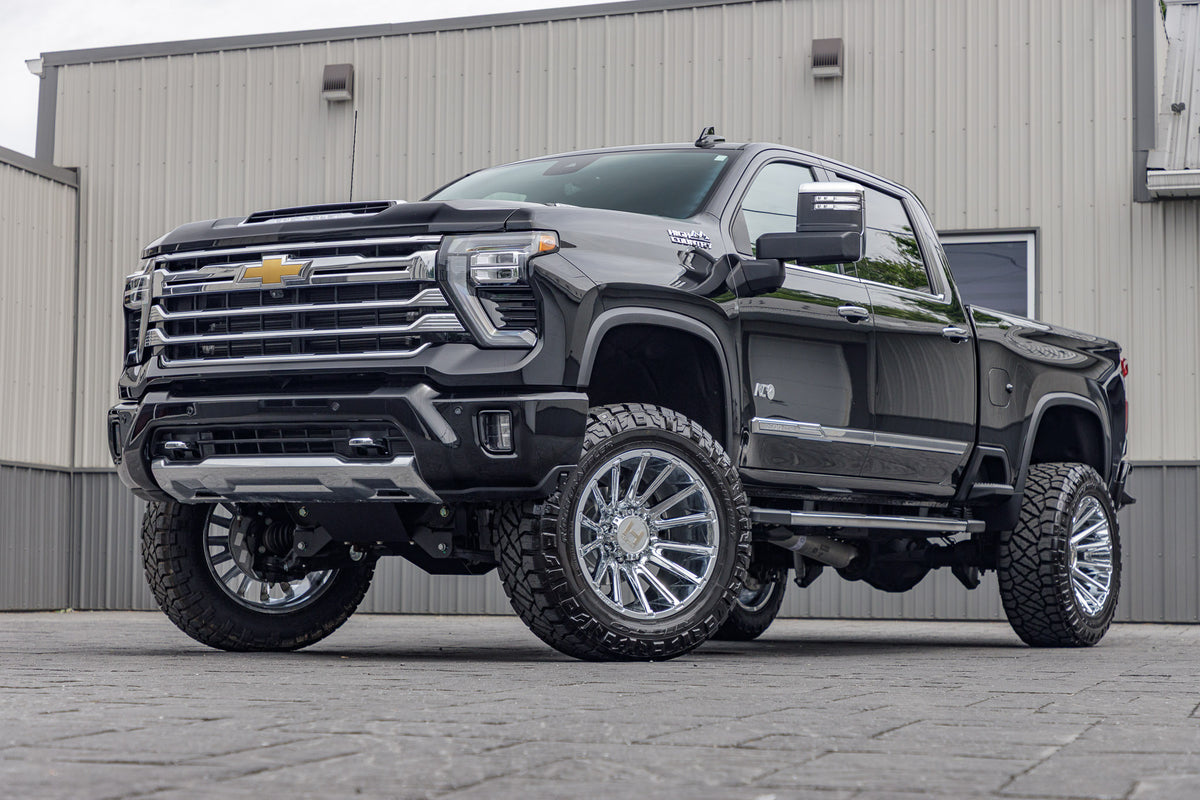 2024 Chevrolet Silverado 3500HD High Country with a 5" BDS lift kit, 22x12 Hostile Typhoon wheels, and 37" Nitto Ridge Grappler tires.