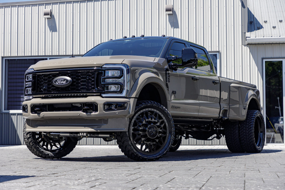 2026 Ford F-450 Super Duty Platinum with a 4" Wicked lift kit, 26x8.25 American Force Shrapnel wheels, and 37" AMP Terrain Attack M/T A tires.