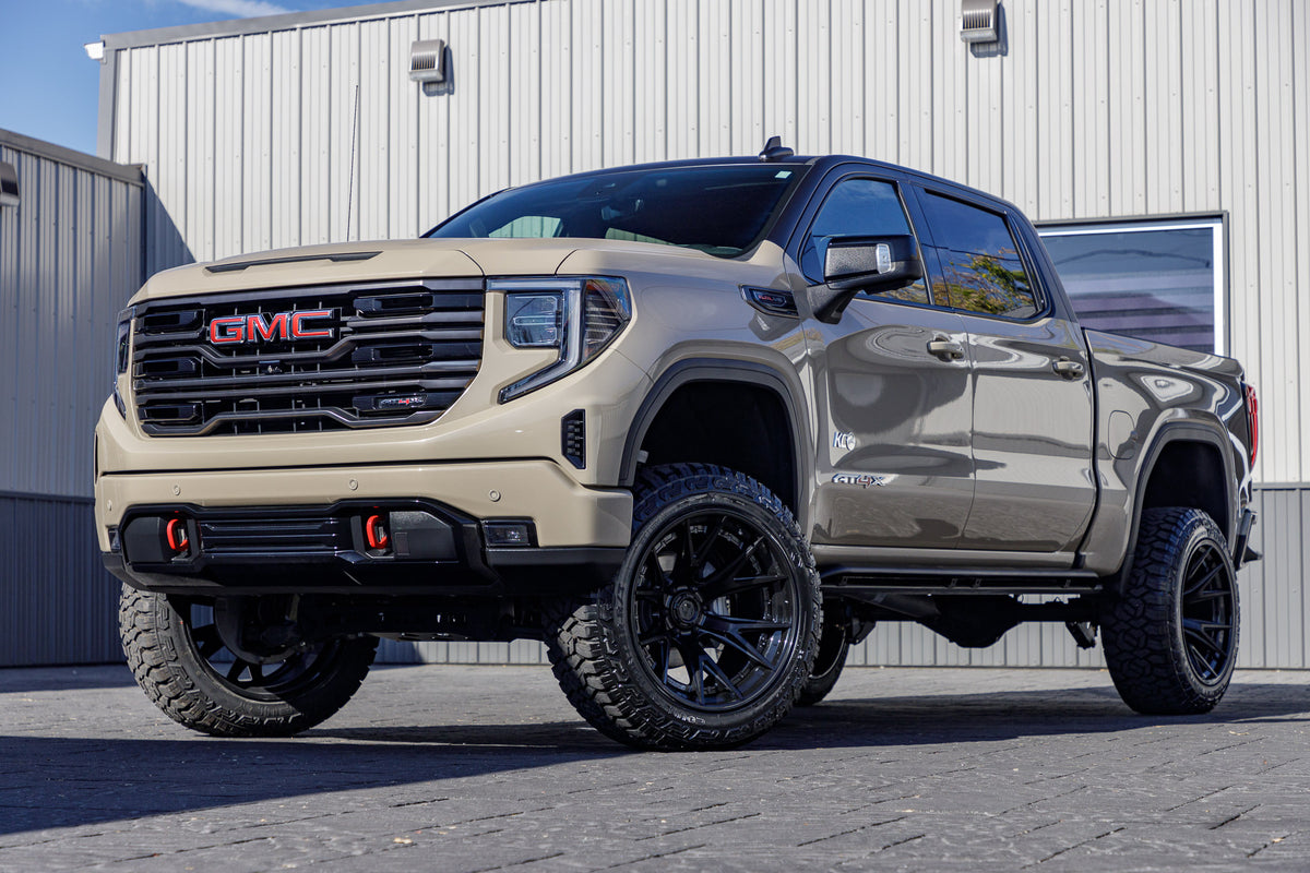 2022 GMC Sierra 1500 AT4X with a 4" ReadyLift lift kit, 22x12 Fuel Catalyst wheels, and 35" Fury Country Hunter R/T tires.