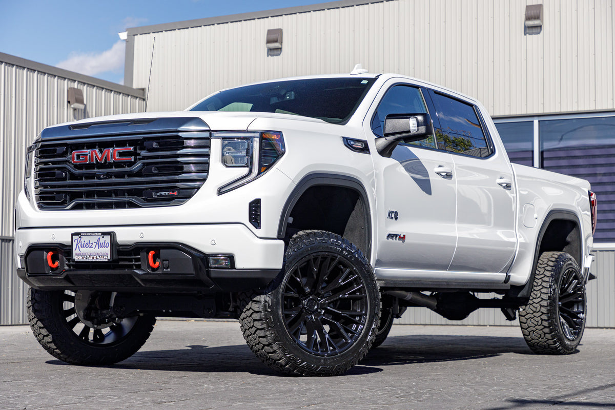 2024 GMC Sierra 1500 AT4 with a 6" Rough Country lift kit, 22x12 Fuel Rebar wheels, and 35" Fury Country Hunter R/T tires.