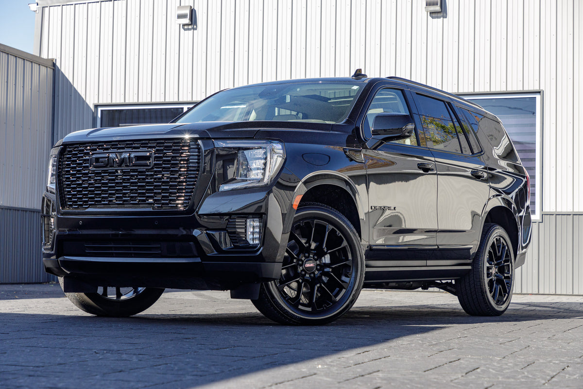 2024 GMC Yukon Denali with GMC Factory Stock, 22x9 GMC Stock wheels, and Bridgestone Alenza tires.