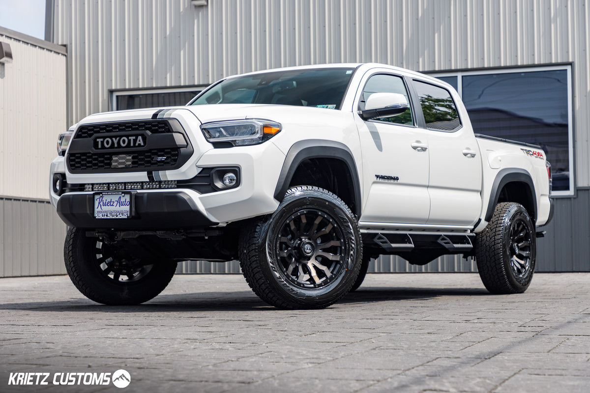 2022 Toyota Tacoma SR5 with a 6" lift kit, 20x10 Fuel Rebel wheels, and 33" Atturo Trail Blade A/T tires,
