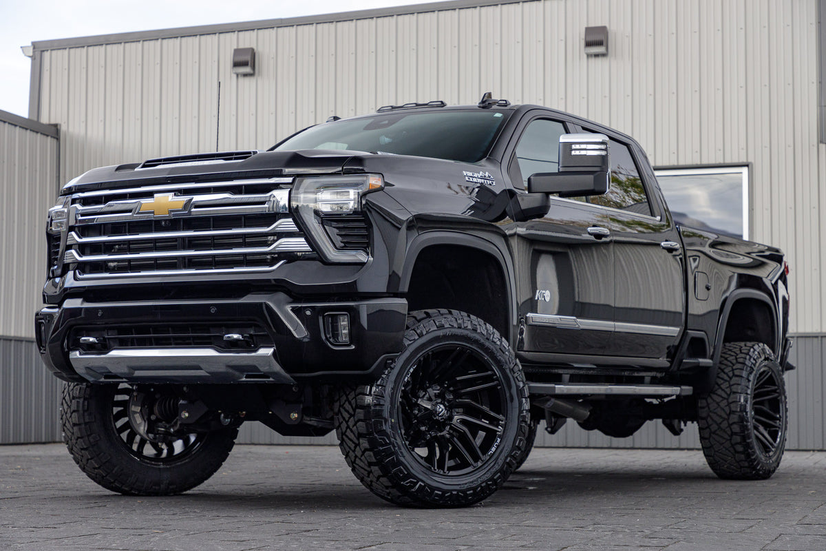 2024 Chevrolet Silverado 3500 High Country with a 5" BDS lift kit, 22x12 Fuel Typhoon wheels, and 37" Nitto Ridge Grappler tires.
