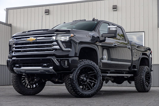 2024 Chevrolet Silverado 3500 High Country with a 5" BDS lift kit, 22x12 Fuel Typhoon wheels, and 37" Nitto Ridge Grappler tires.