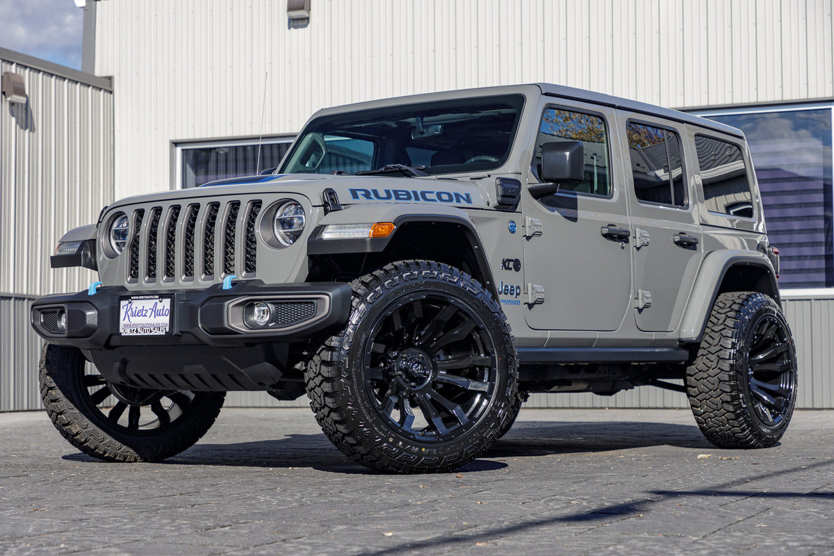 2022 Jeep Wrangler Unlimited Rubicon 4XE with Jeep Stock suspension, 22x12 Fuel Blitz wheels, and 35" Fury Country Hunter R/T tires.
