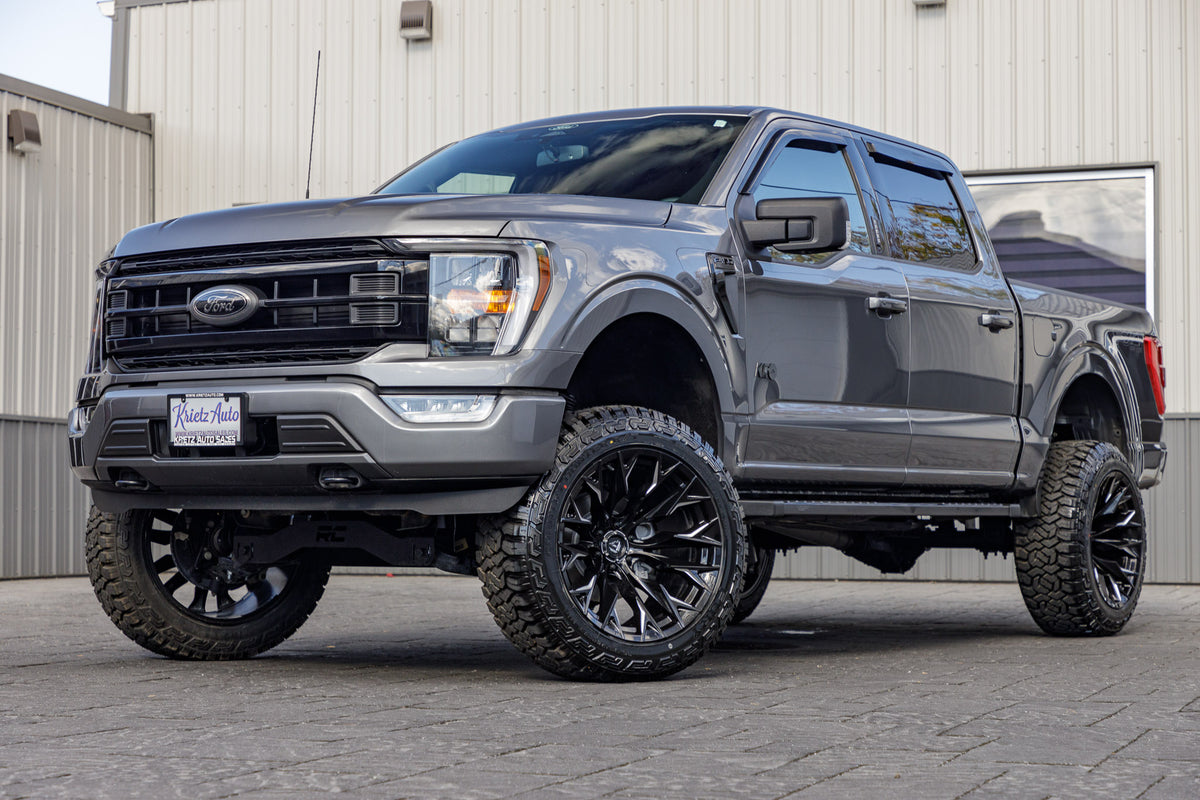 2022 Ford F-150 XLT with a 6" Rough Country lift kit, 22x12 Fuel Flame wheels, and 35" Fury Country Hunter R/T tires.