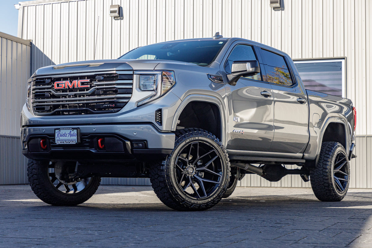 2024 GMC Sierra 1500 AT4 with a 6" Rough Country lift kit, 22x12 Fuel Flux wheels, and 35" Fury Country Hunter R/T tires.