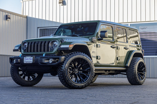 2024 Jeep Wrangler Unlimited Rubicon 4XE with Jeep Factory suspension, 22x12 Fuel Rebar wheels, and 35" Fury Country Hunter R/T tires.