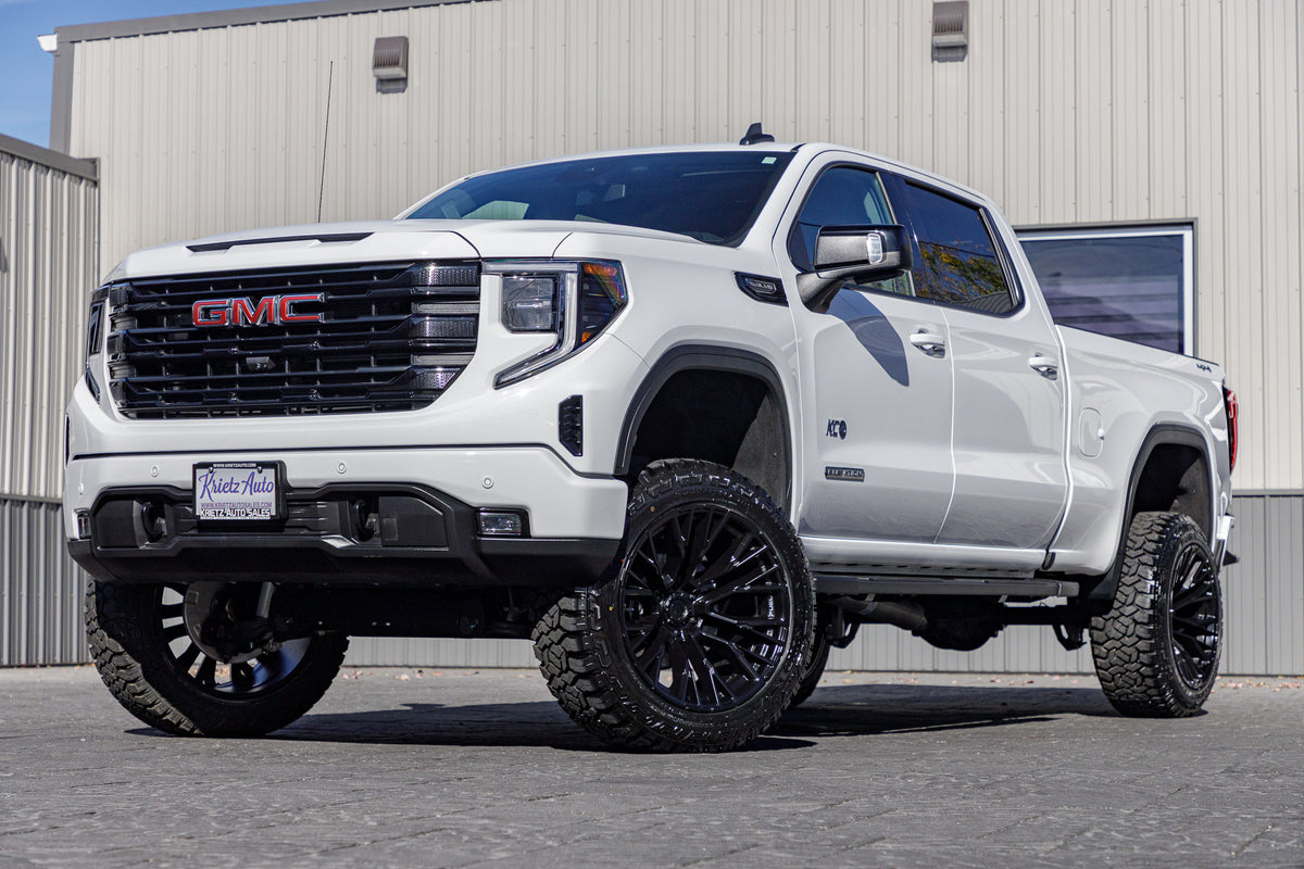 2024 GMC Sierra 1500 Elevation with a 6" Rough Country lift kit, 22x12 Fuel Rebar wheels, and 35" Fury Country Hunter R/T tires.
