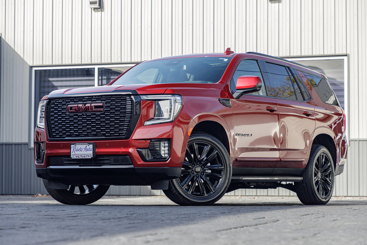 2023 GMC Yukon Denali with GMC Factory suspension, 22x9 GMC Stock wheels, and Bridgestone Alenza tires.