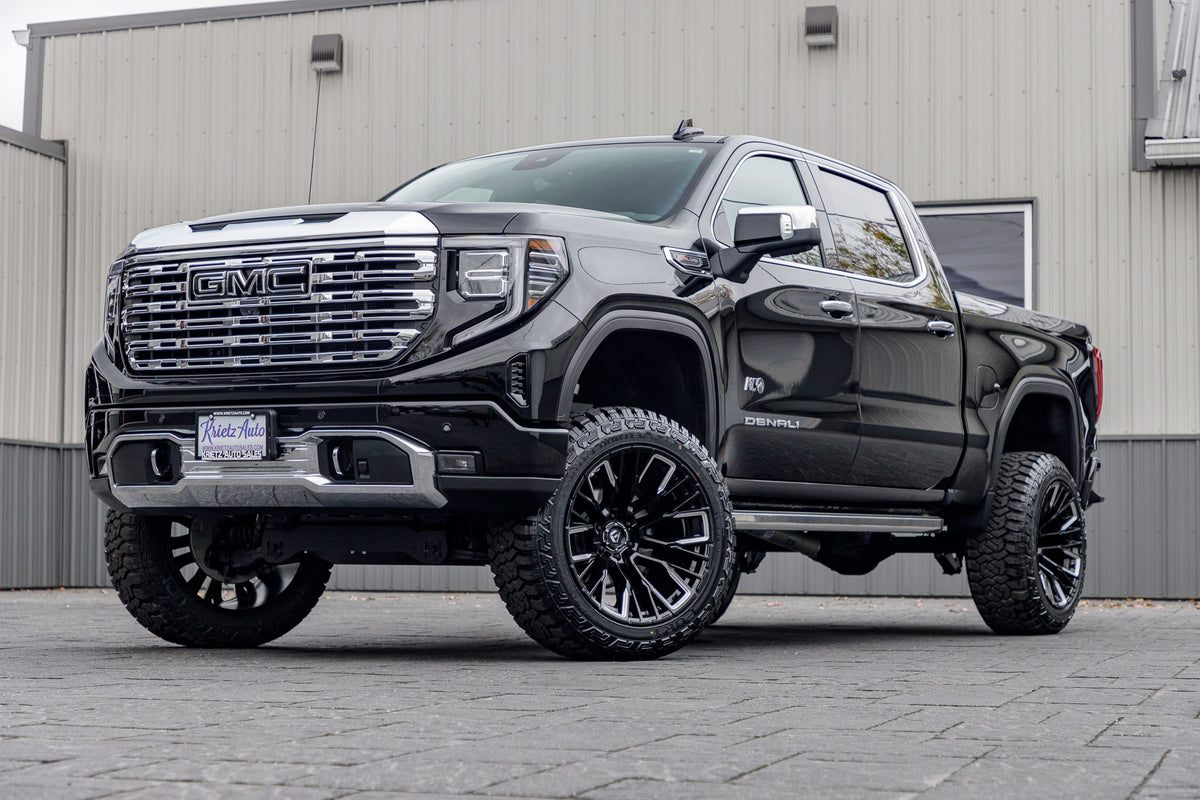2023 GMC Sierra 1500 Denali with a 6" Rough Country lift kit, 22x12 Fuel Rebar wheels, and 35" Fury Country Hunter R/T tires.