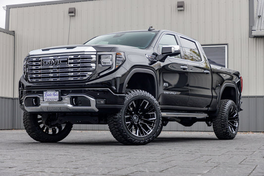 2023 GMC Sierra 1500 Denali with a 6" Rough Country lift kit, 22x12 Fuel Rebar wheels, and 35" Fury Country Hunter R/T tires.