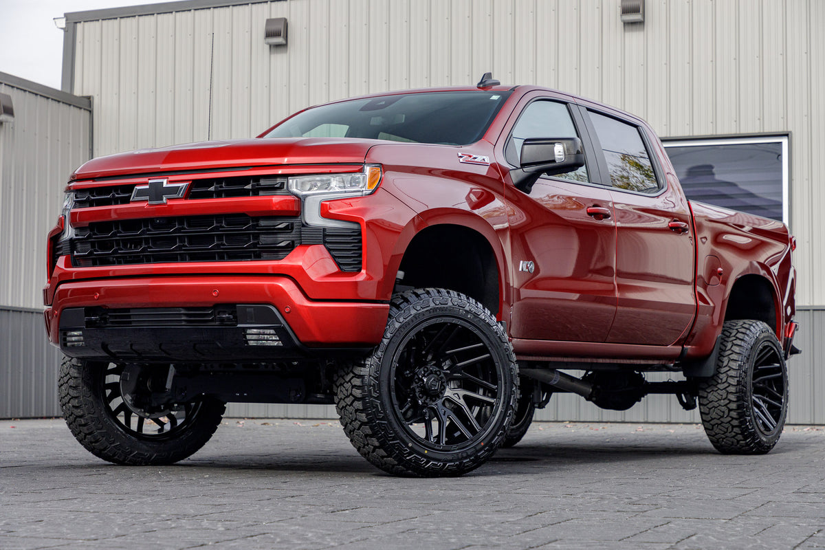 2024 Chevrolet Silverado 1500 RST with a 6" Rough Country lift kit, 22x12 TIS 554B wheels, and 35" Fury Country Hunter R/T tires.