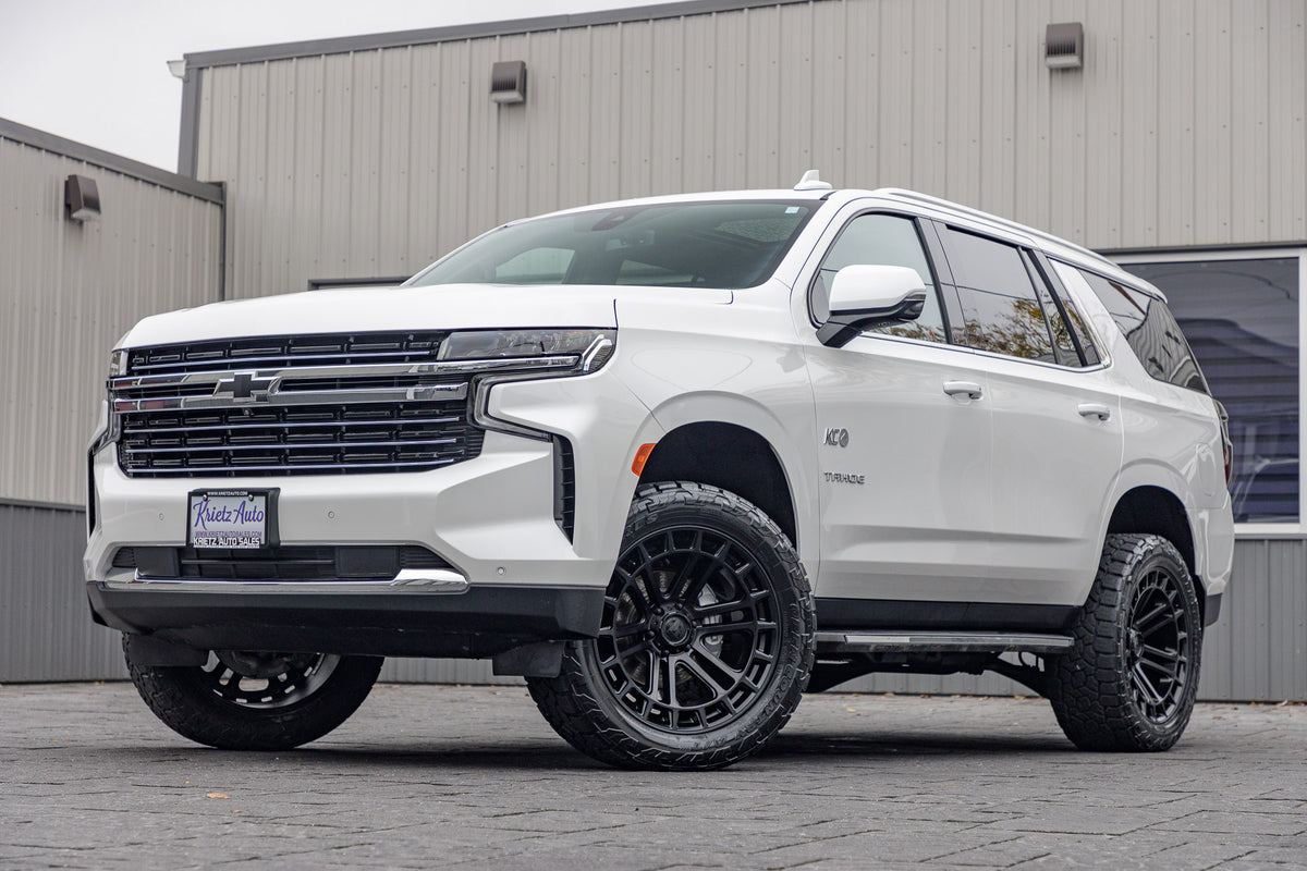2022 Chevrolet Tahoe LT with a 3" ReadyLift lift kit, 22x10 Fuel Heater wheels, and 295/50 Toyo Open Country AT3 tires.