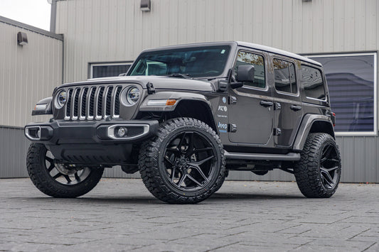2021 Jeep Wrangler Unlimited Sahara 4XE with a 2.5" Rough Country lift kit, 22x12 Fuel Flux wheels, and 35" Fury Country Hunter R/T tires.